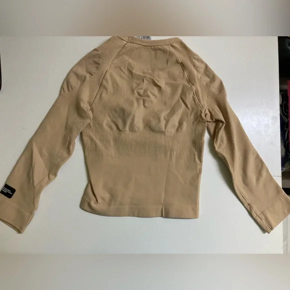 ADIDAS
Women Solid Round Neck Beige T-Shirt - Picture 9 of 9